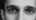  Facial closeup photo suggesting human appearance misery as suffering